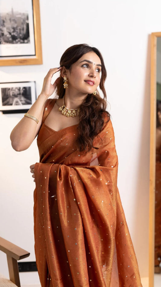 Shagun Rust Orange Tissue Silk Saree