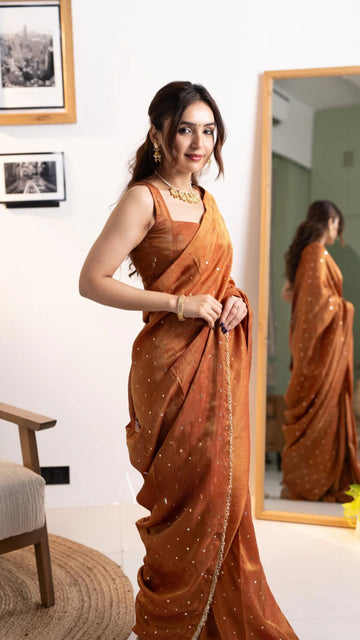 Shagun Rust Orange Tissue Silk Saree